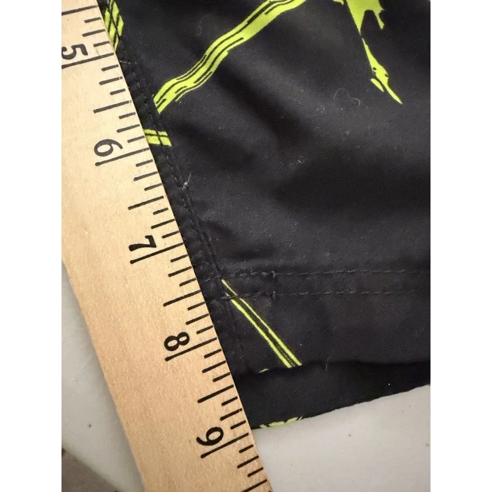 Maui and Sons black swim trunks with neon yellow/green graphic pattern Size 34